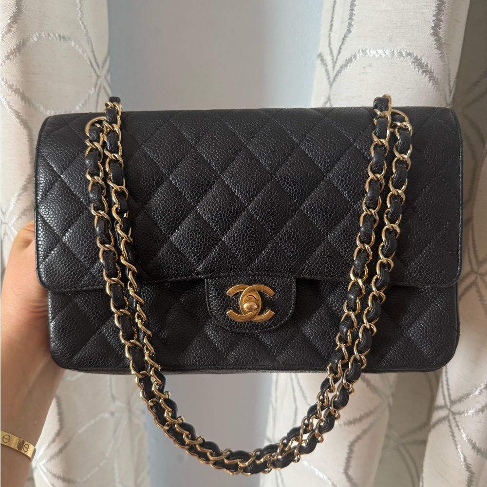 Chanel Black caviar double flap Bag with Gold hardware